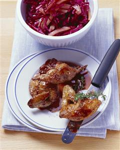 Roast quail with red cabbage salad and quince vinaigrette