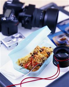 Bulgur with apricots and figs in a plastic box