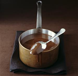 Melted chocolate in a copper pan