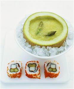 Chilled asparagus soup in melon half and inside-out sushi