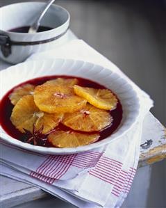 Oranges in red wine