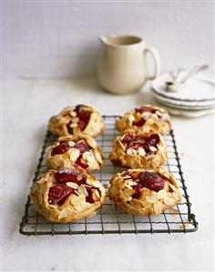 Plum pies with flaked almonds