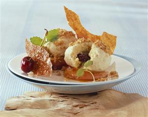 Curd cheese dumplings with cherries on caramelised apple slices