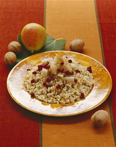 Risotto with cheese, pears and pomegranate seeds