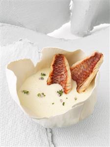 Garlic soup with red mullet fillets