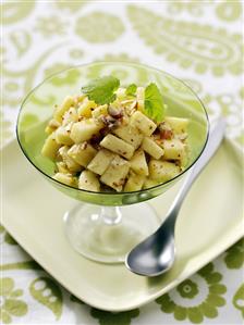 Apple salad with maple syrup and hazelnuts