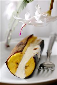 Baked banana with cream cheese stuffing