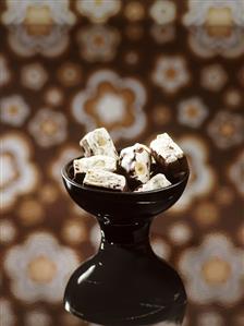 Chocolate-coated white nougat (Montelimar nougat)