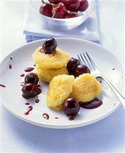 Polenta cakes with sour cherries