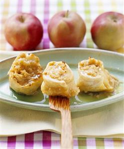 Sweet apple buns cooked in frying pan