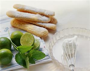 Whisk, beaten egg white, tart dish, limes, sponge fingers