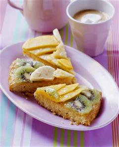 Exotic fruit cake with coconut macaroon base