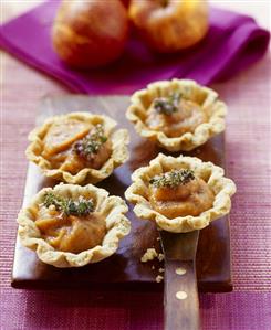 Savoury tarts with tomato & apple chutney filling & thyme