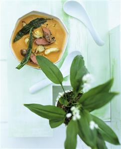 Tomato & artichoke soup with ramsons (wild garlic) & lamb fillet