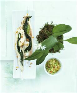 Skewered sole fillets & ramsons with nuts & melon salsa