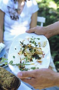 Mozzarella with garlic and orange dressing