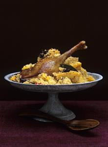 Couscous with goose confit and quinces