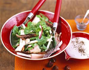 Corn salad with celeriac, dates and hazelnuts