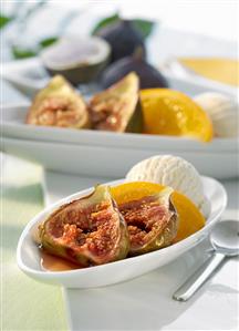 Figs poached figs in honey and wine with vanilla ice cream