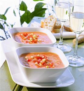 Two dishes of gazpacho (Spain) & two glasses of white wine