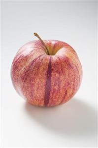 A whole apple (variety: Royal Gala)