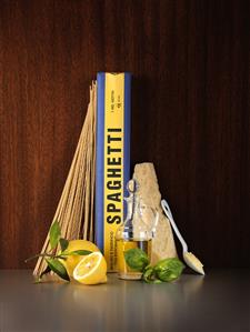 Italian still life with pasta, oil and cheese