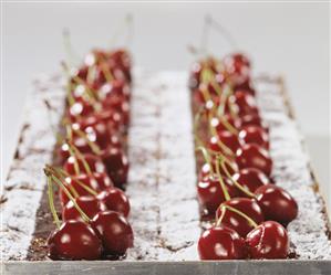 Kirschenplotzer (cherry cake) topped with fresh cherries