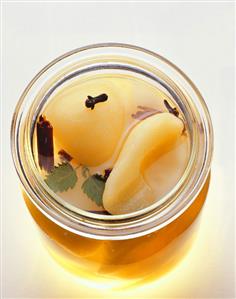 Bottled pears in a preserving jar