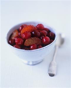 A small bowl of cranberry, clementine and port relish