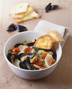 Potato soup with mussels and toast