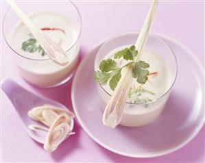 Cold lemon grass soup with coriander in two glasses