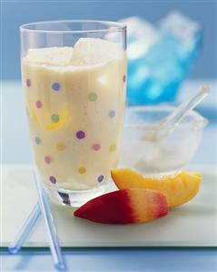 A glass of nectarine yoghurt lassi