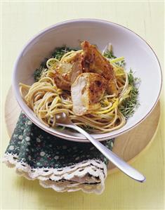 Guinea fowl breast on wholemeal spaghetti with lemon on cress