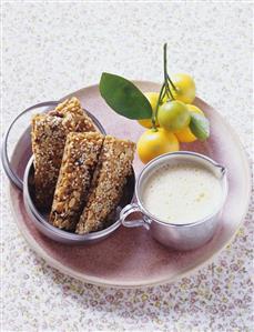 Oat bars with mandarin orange cream for dipping