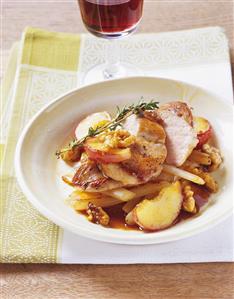 Fried pheasant breast with apples and walnuts