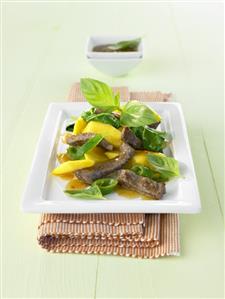 Beef with spinach and mango