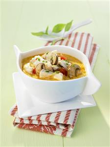 Spicy chicken stew with coconut and mushrooms