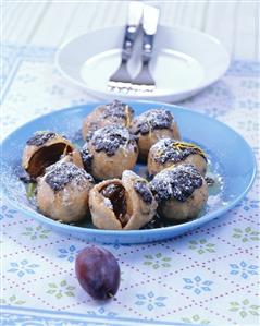 Damson dumplings with poppy seed butter