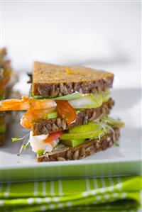 Club sandwich with prawns and pears