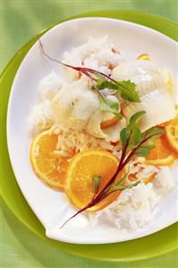 Sole with orange slices and rice