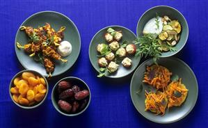 Mezze board: carrot & orange salad, dates, chicken skewers