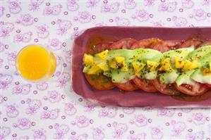 Avocado & tomato carpaccio with orange & chilli vinaigrette