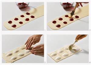 Making sweet ravioli with cherry filling