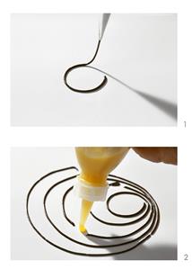 Making a dessert decoration with chocolate and fruit puree