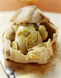 Poussin with lime in pastry crust