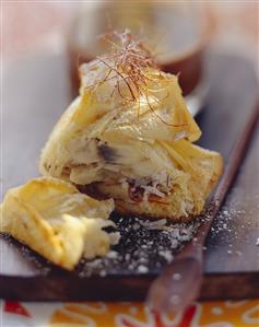 Baked banana in filo pastry with shreds of chilli