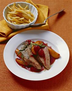 Loin of wild hare with cinnamon, raspberries and peaches