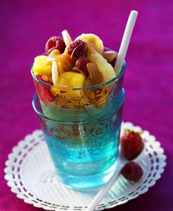 Fruit salad with caramel in a glass