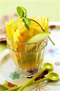 Citrus fruit salad with green apple and mint