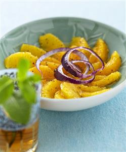 Orange salad with red onion rings